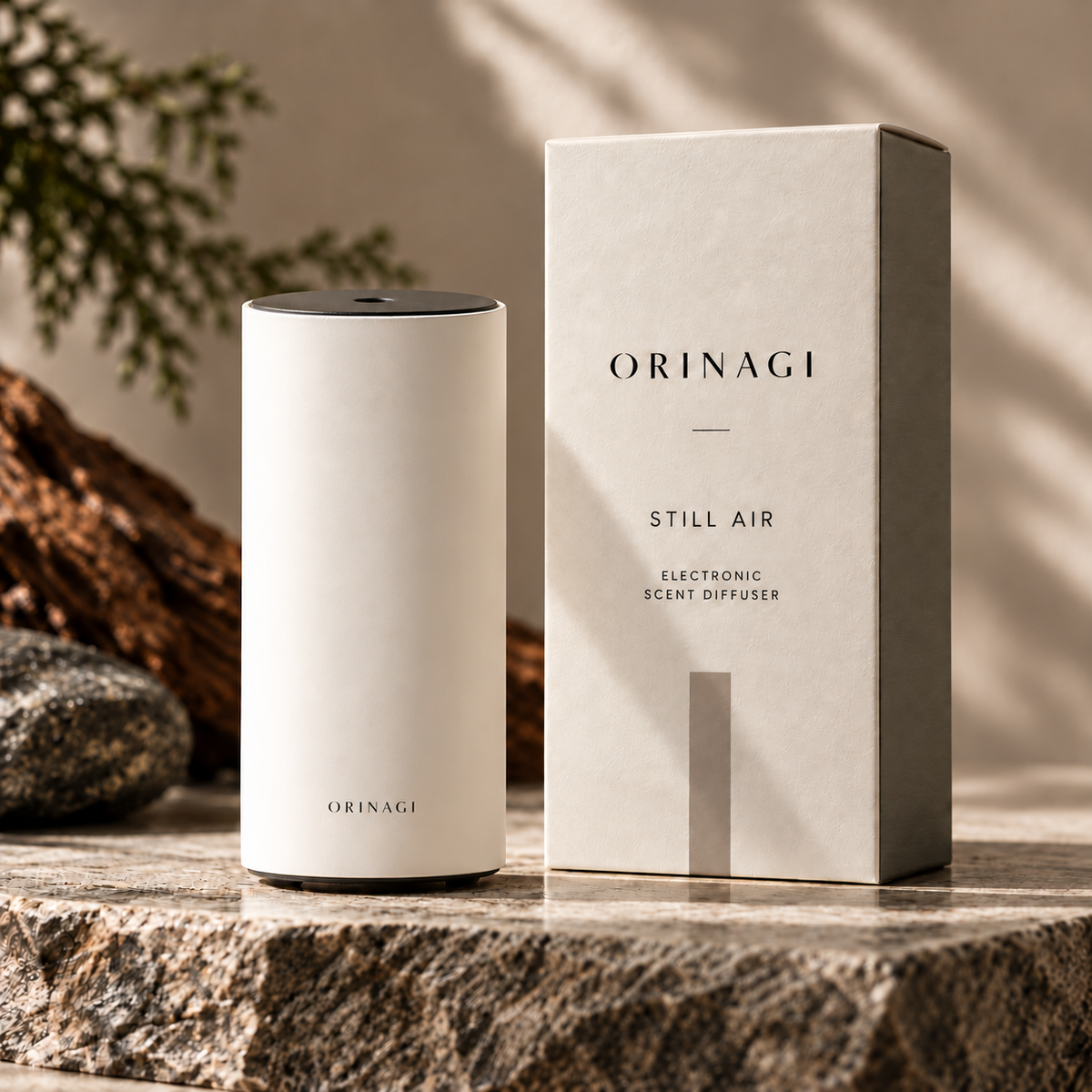 STILL AIR diffuser with a small ORINAGI logo at the base — packaging concept